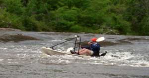 Zach runs the drop in the Freedom Hawk 12 kayak...